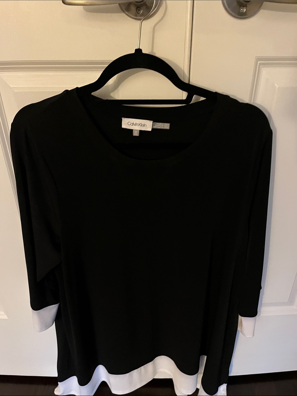 Calvin Klein Black Long Sleeve Top with White Hem & Cuffs. Dressy top